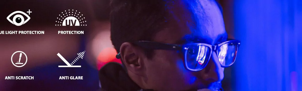 A man is wearing a glasses in a blue lights
