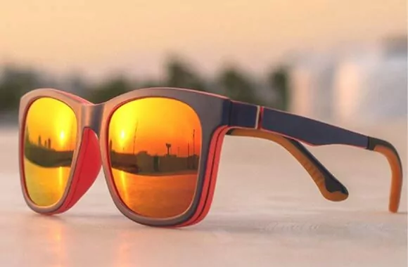 Red Mirrored lense Glasses on the floor